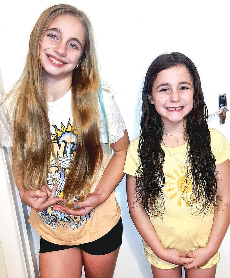 Sisters donate hair in memory of grandmother for cancer post image