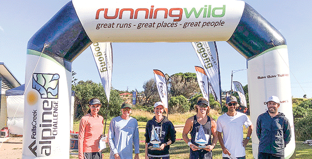 Competitors run the coastal trail post image
