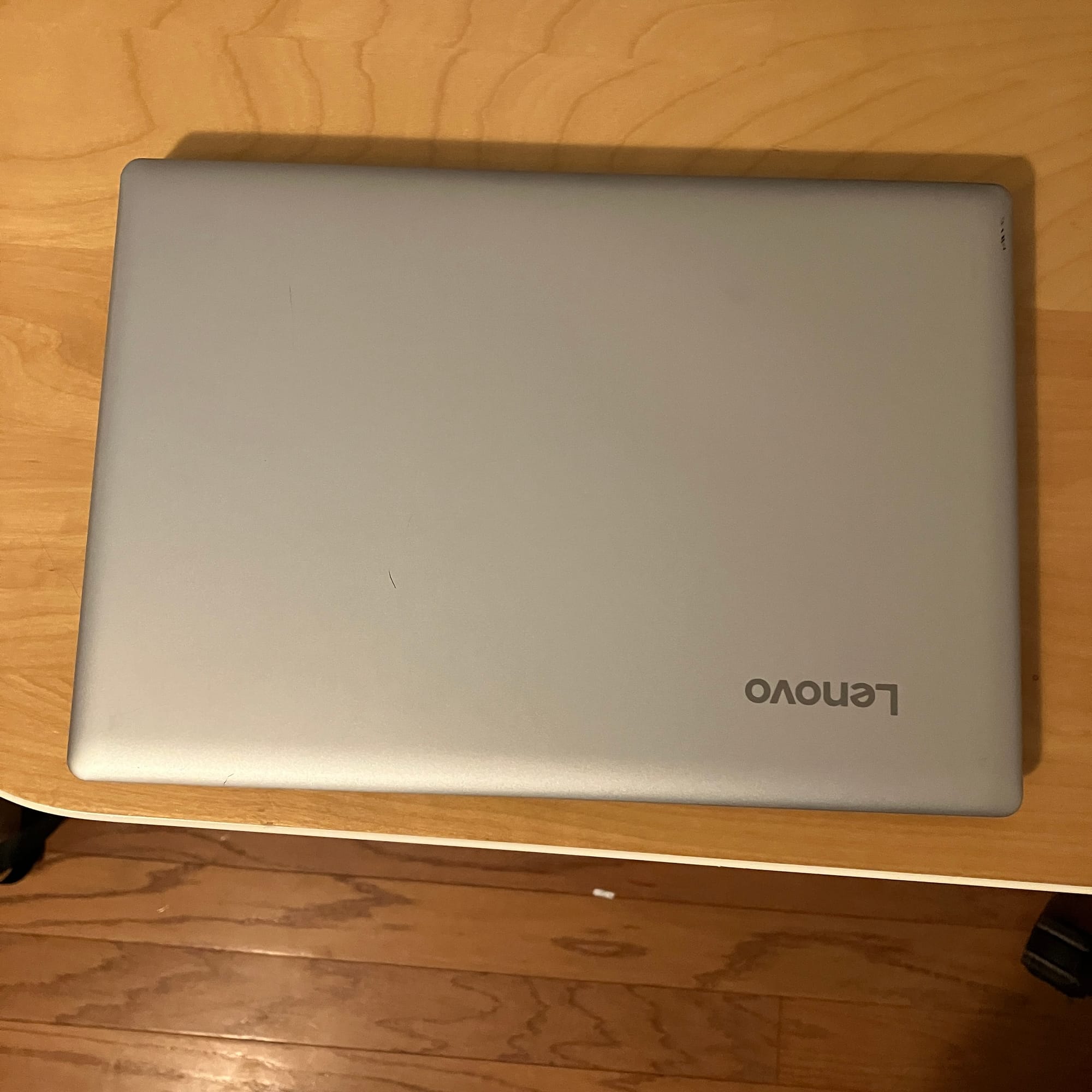 The Lenovo IdeaPad 100S-11IBY with the lid closed