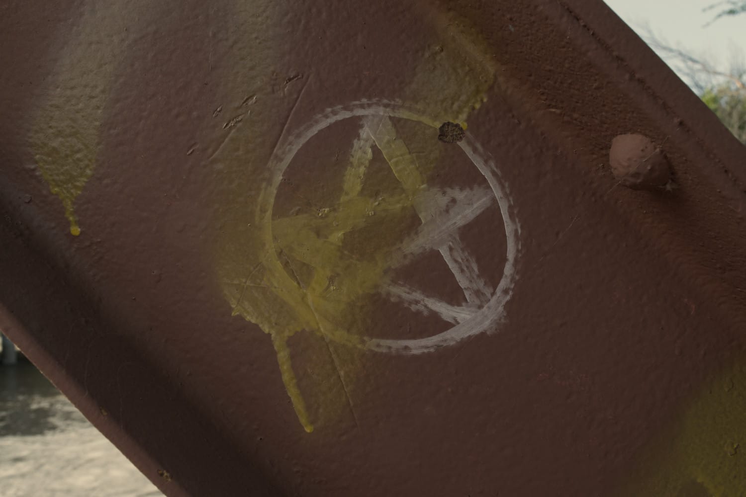 A pentagram spray-painted on Goatman’s Bridge in Denton, Texas