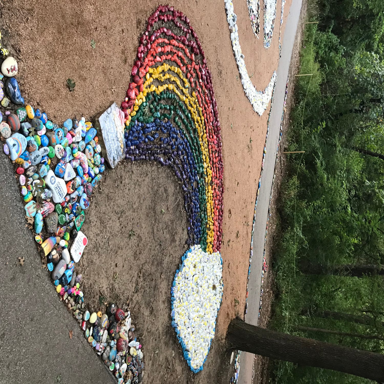 Rocks at the Parr Park Rock Art Trail forming a rainbow