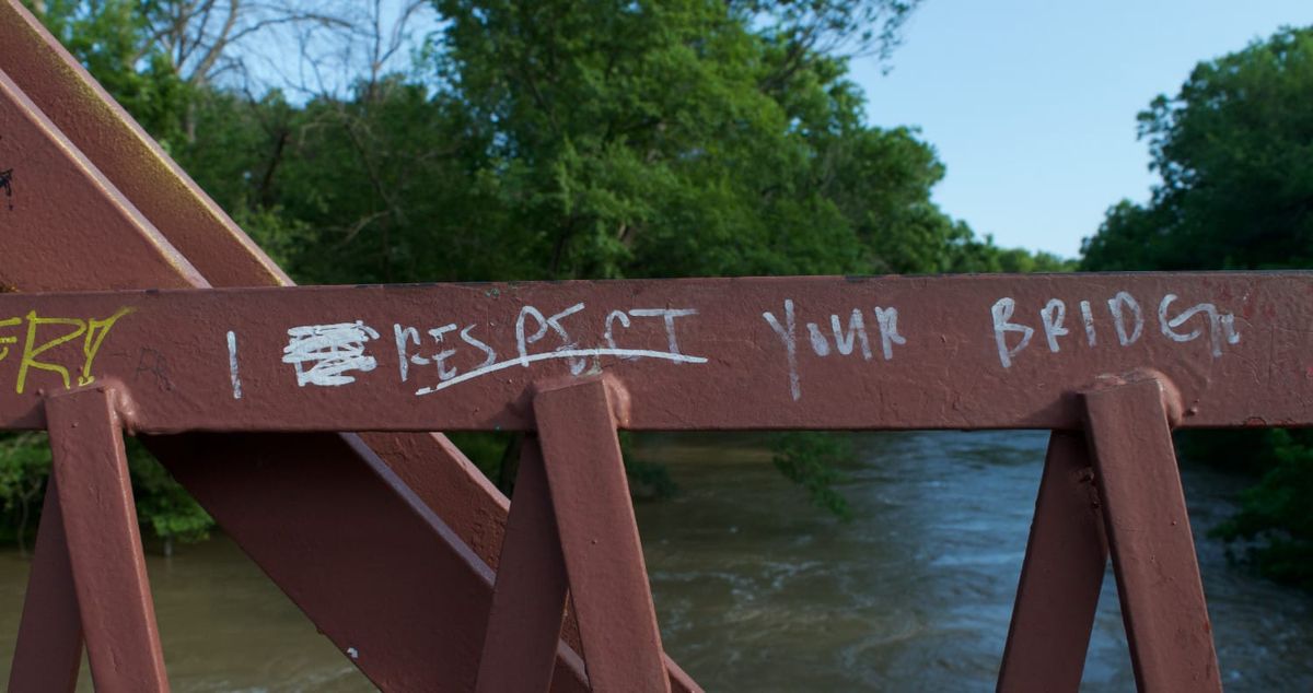 Graffiti that says 'I respect your bridge' on Goatman's Bridge in Denton, Texas