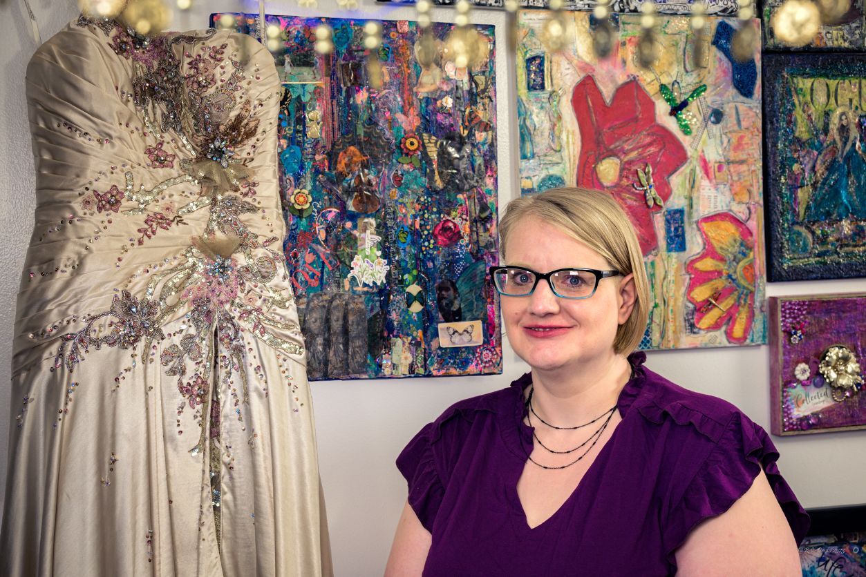 Artist Phena Keil poses for a photo with her work in Fergus Falls, Minn. on May 5, 2023. (R.C. Drews for Project Optimist)
