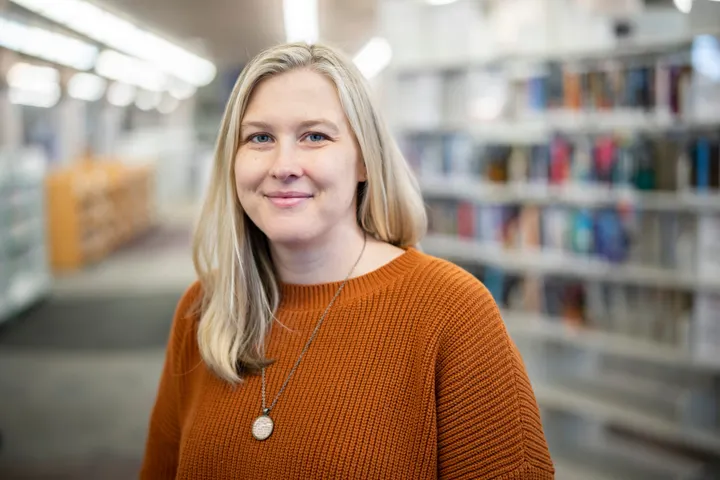Woman poses for a portrait.