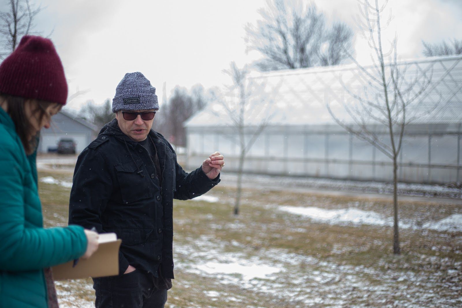 Journalist Nora Hertel interviews entrepreneur Walter Ribeiro in Wadena, Minn., on March 25, 2022. (Shannon Rathmanner for Project Optimist)