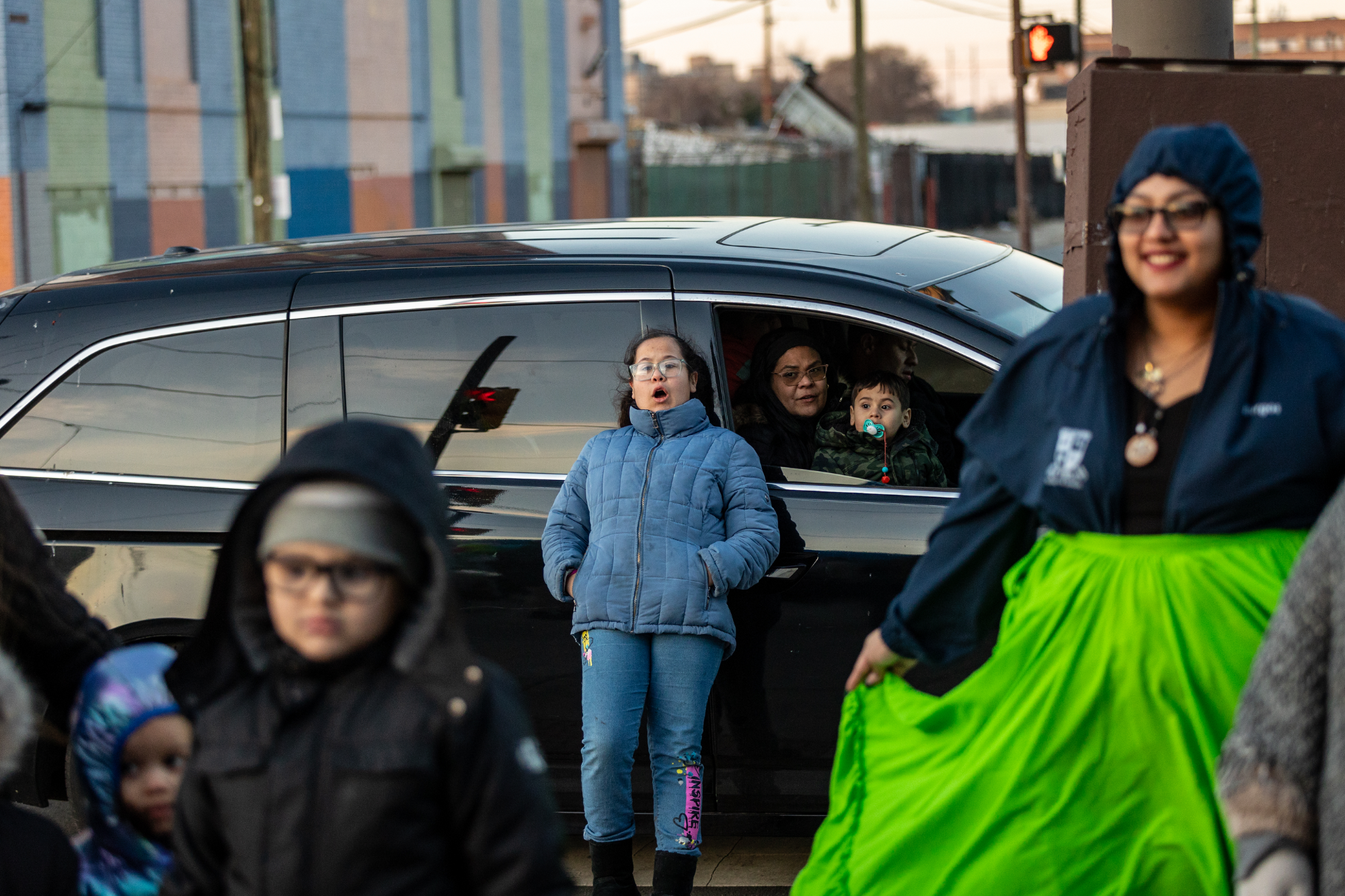 Guests watch from cars as Los Bomberos de la Calle perform