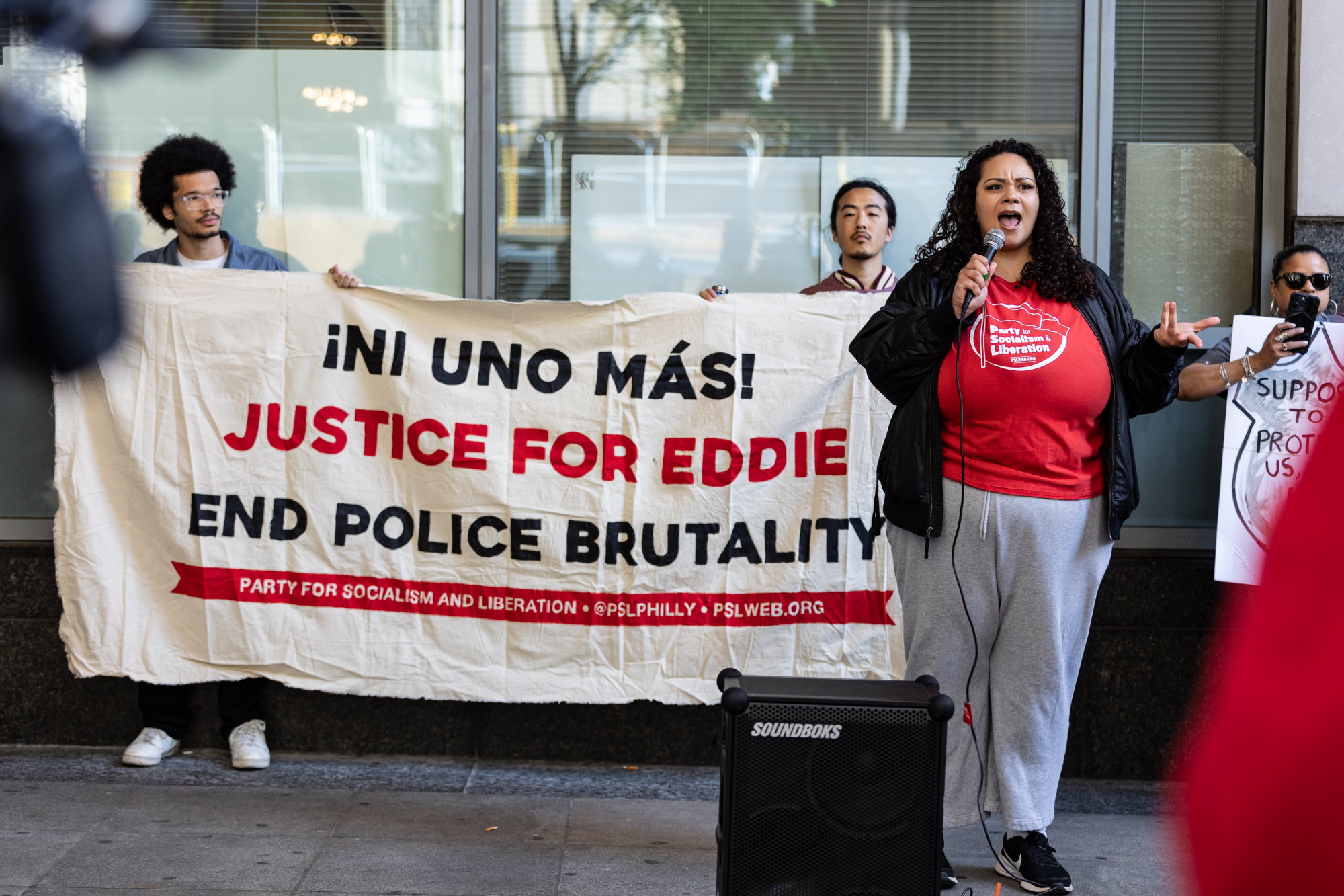 Talia Giles speaks at Justice for Eddie Irizarry rally