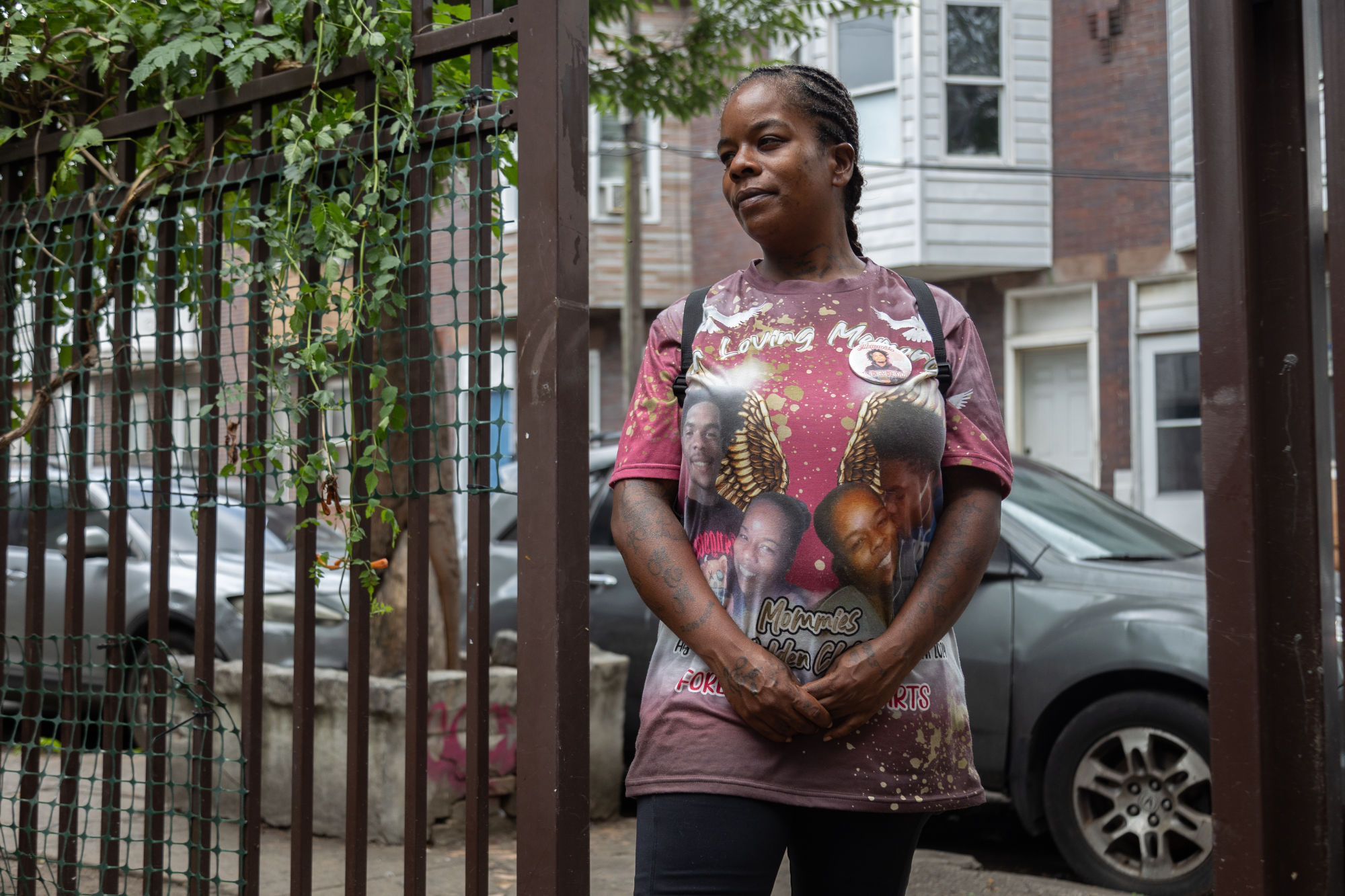 Isela Williams wears a memorial shirt honoring her son Aasim