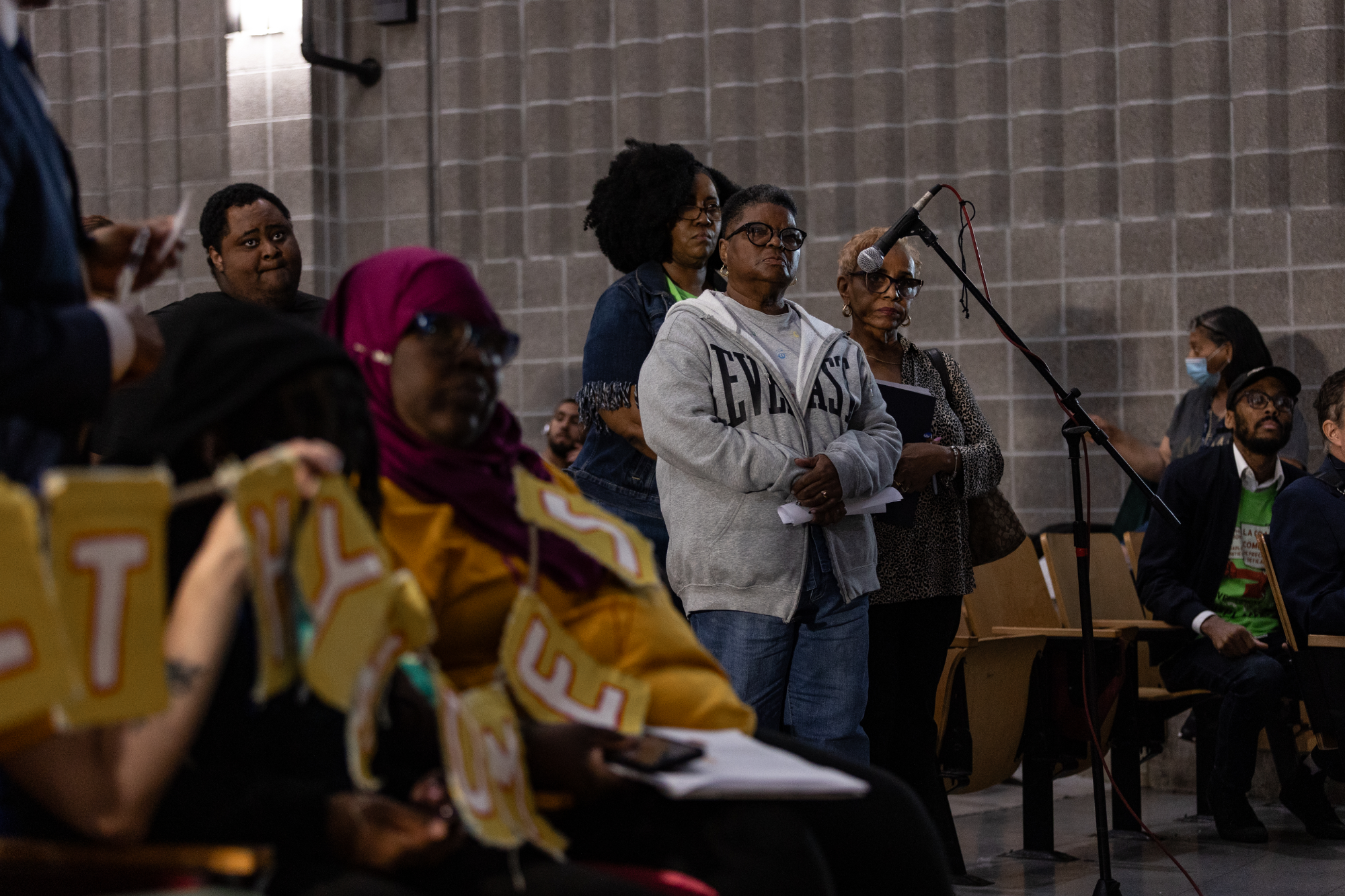 Community members line up to speak at Kensington Caucus town hall