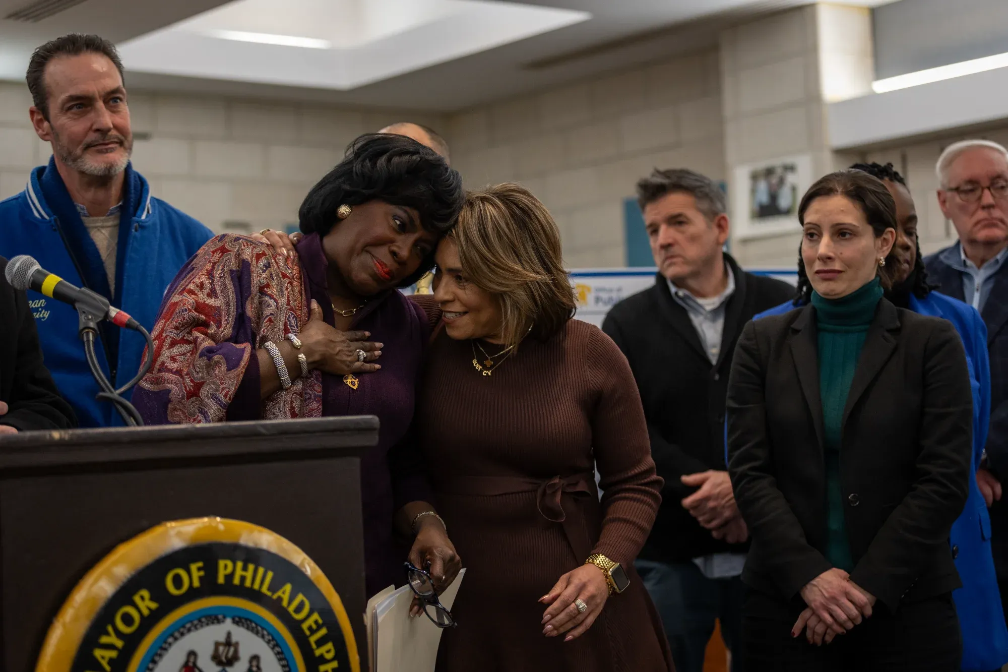 Mayor Parker leans on Councilmember Lozada at Wellness Court announcement