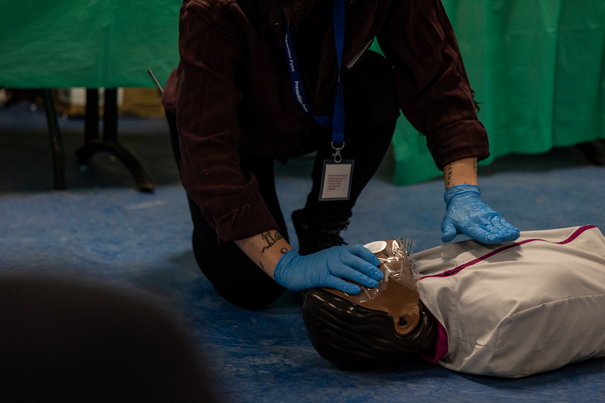 Violet Gehringer demonstrates Narcan administration on a training dummy