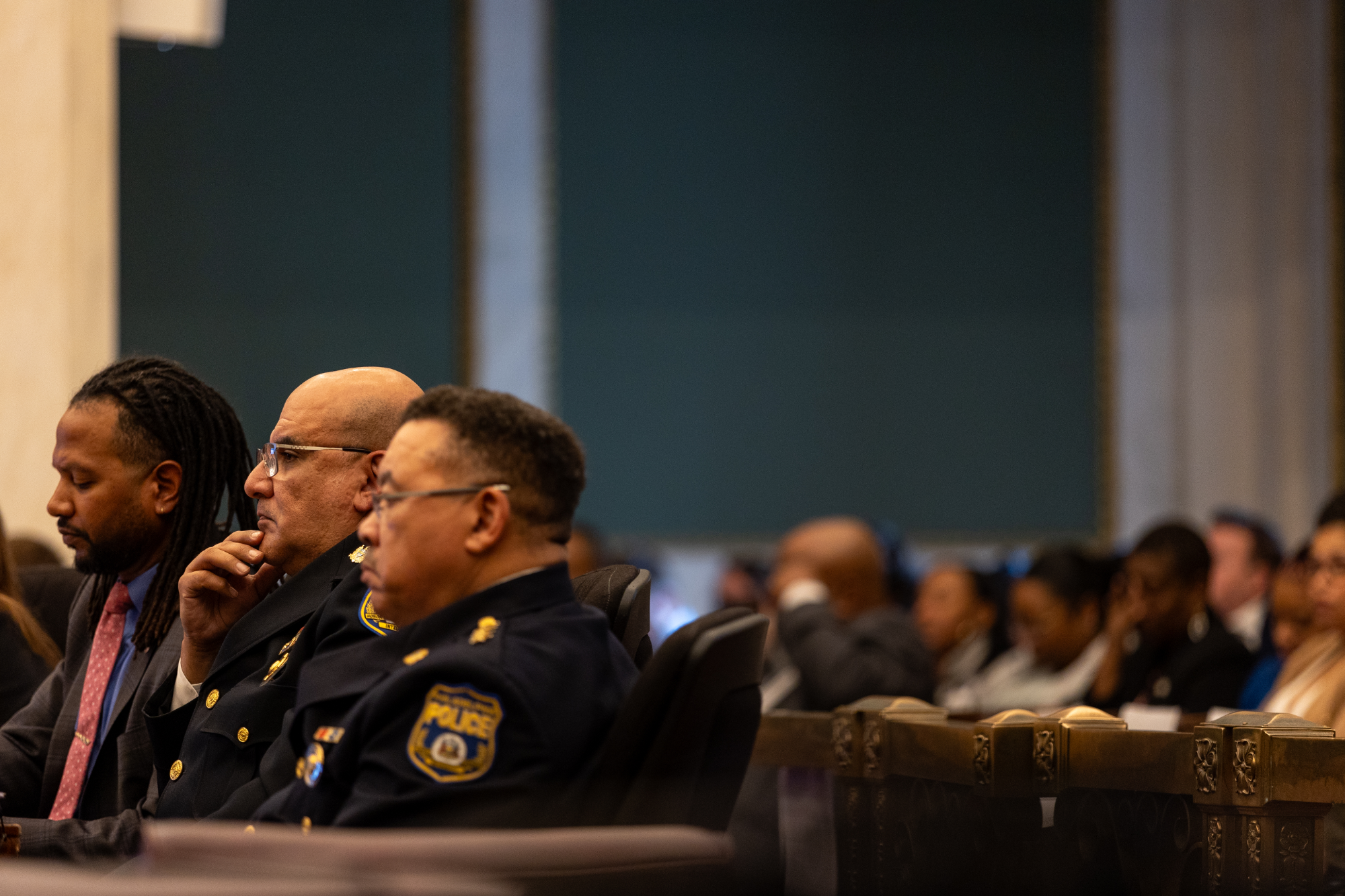 Police Commissioner and Public Safety Director listen at diversion hearing