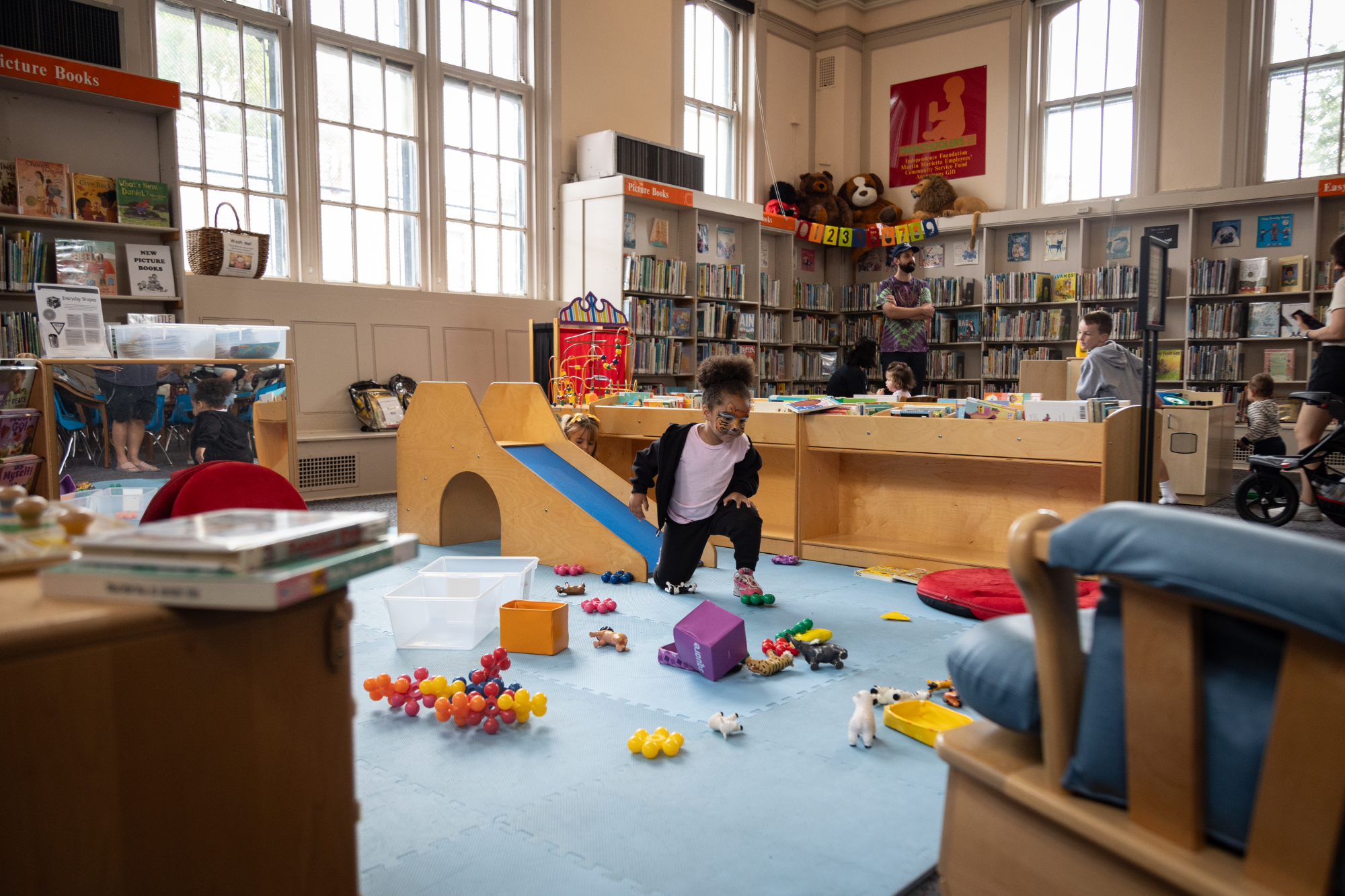 Children play in the new Richmond Library play area