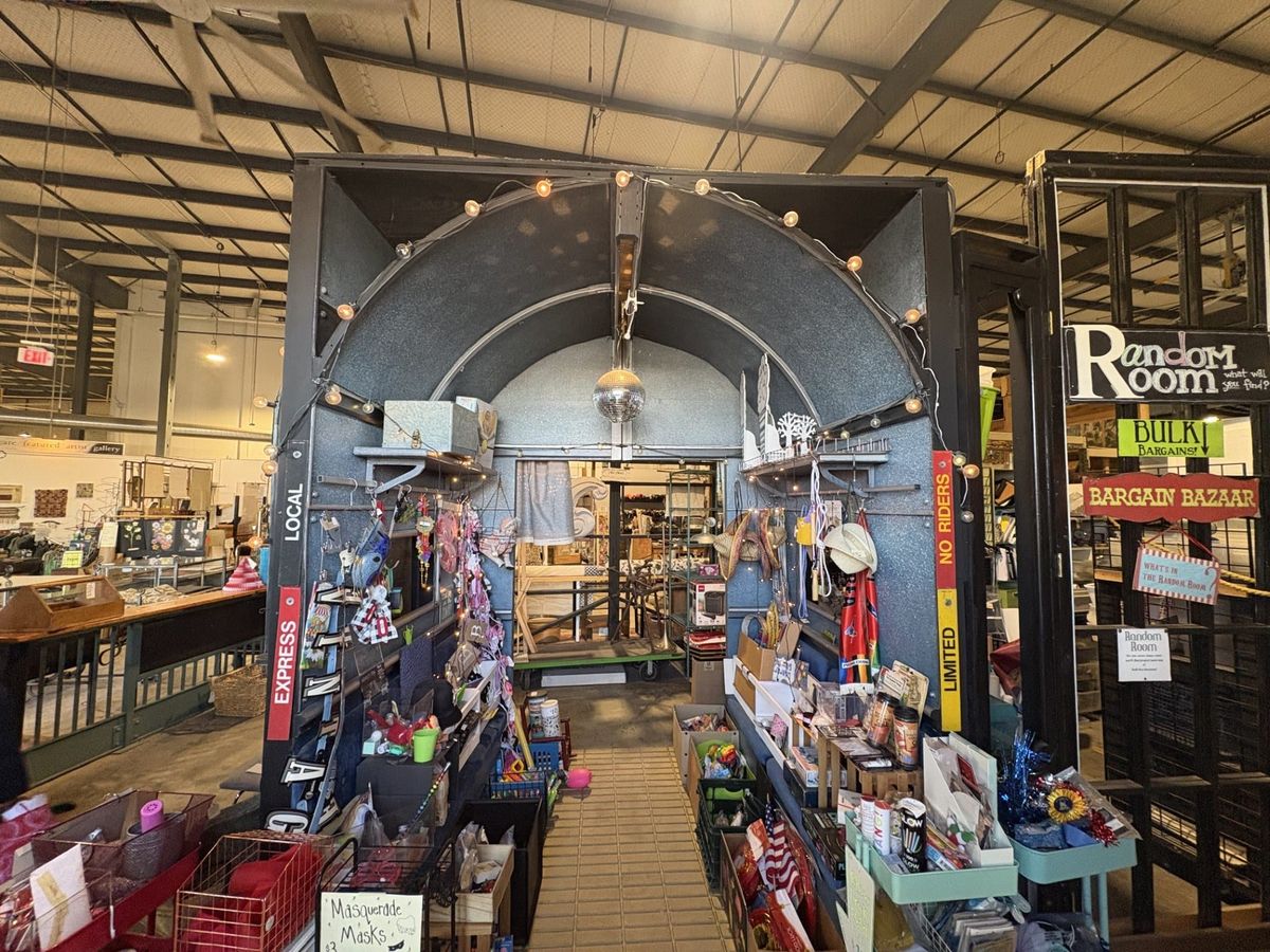 A wooden train car stage prop from "White Christmas" on display at the Resource Exchange.