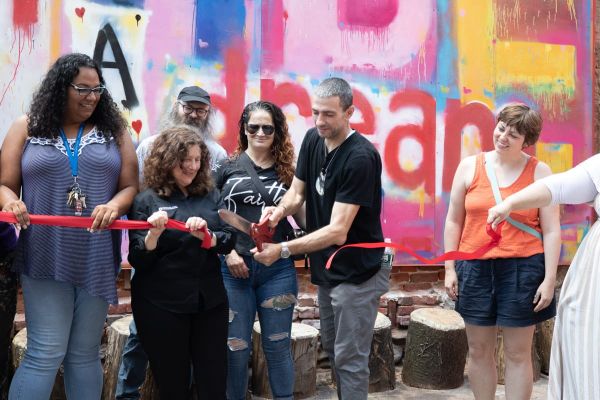 Artist dedicates new Prevention Point Love Lot mural to son: “It doesn't have to be a ‘rock bottom.’ It's a positive sign of hope.”