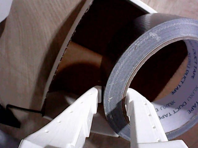 The matching wrist view above the box