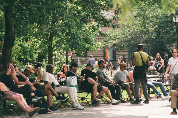 People gathering and relaxing together in a public park