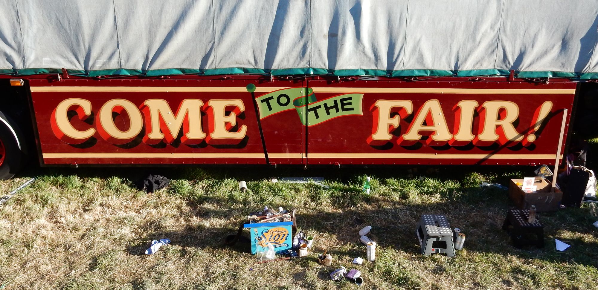 Painted vehicle panel saying 'come to the fair'