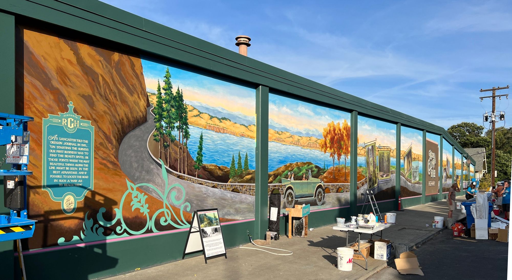 Wall with painting materials in front.