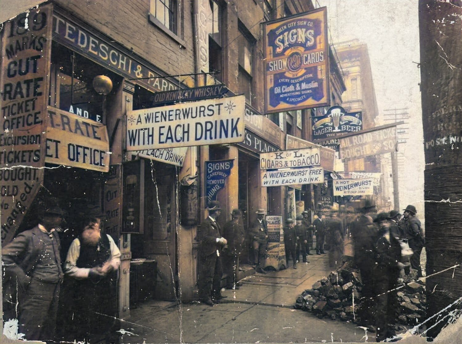 Colourised copy of the photo above, with the Queen City Sign Company sign rendered in blue, yellow, and white.