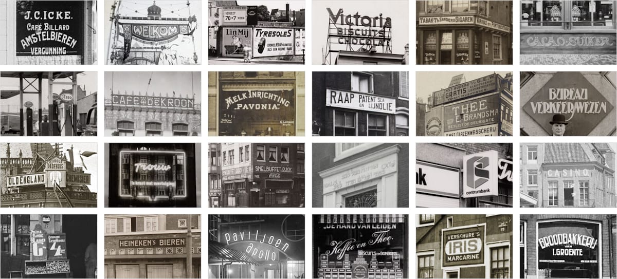 6 × 4 array of black and white photographs, with each focused on a piece of signage, ranging from shopfronts to mural signs and lettering on windows.