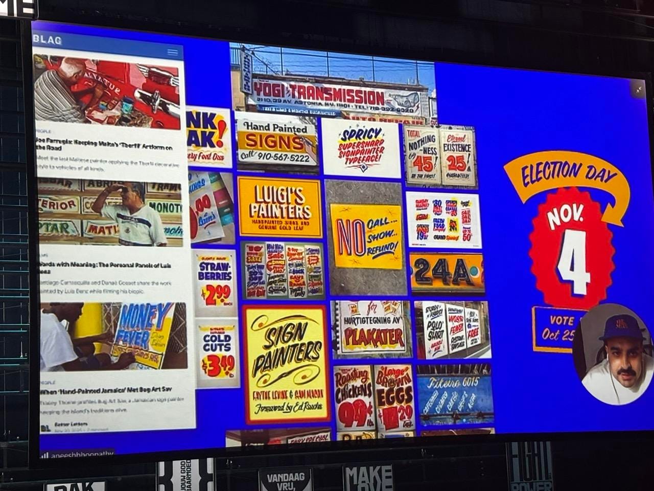Photo of a projection screen showing a slide from a presentation and a small circle bottom right with a video feed of the presenter. The slide shows a variety of sign painting examples, posts from the bl.ag online blog and a graphic inspired by these that says "Election day, Nov. 4".