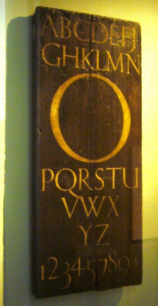 Painted alphabet on wood by Eric Gill