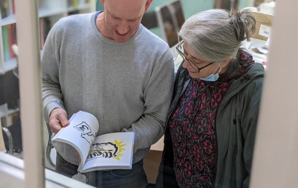 Sharing the Showcards Book with Ariceli at BCN Visions.