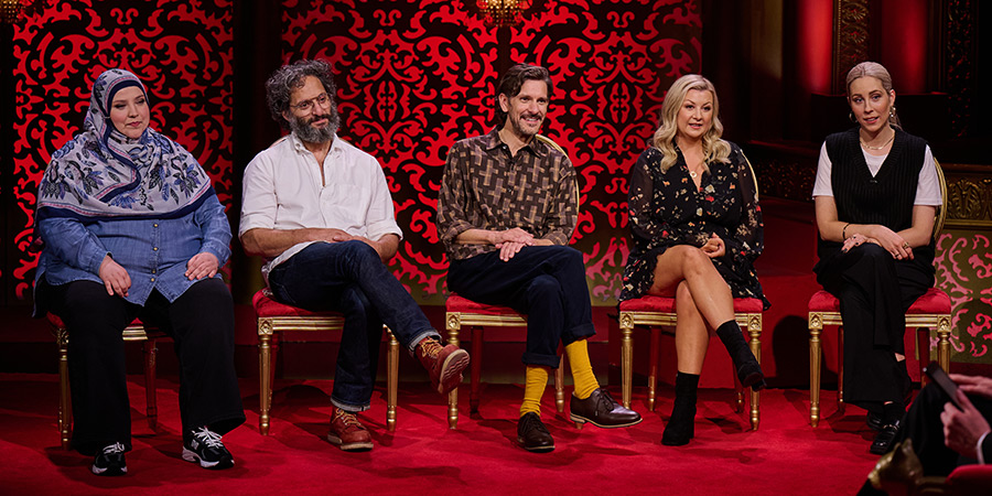 The cast of Taskmaster Series 19 on set, sitting in their chairs