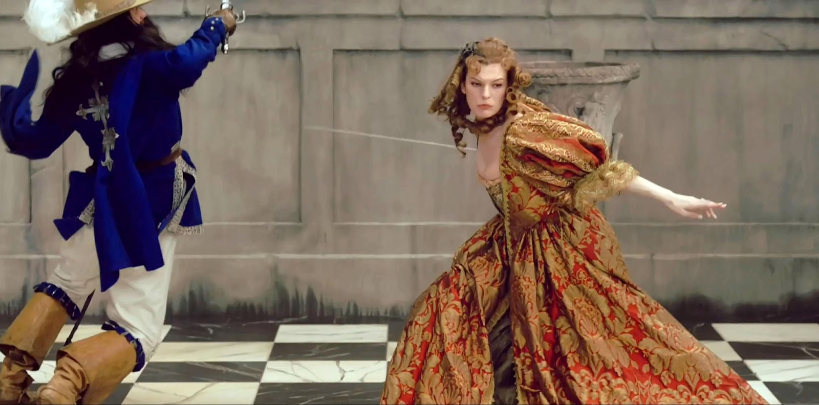Milla Jovovich kicking ass, swordfighting in a ballgown