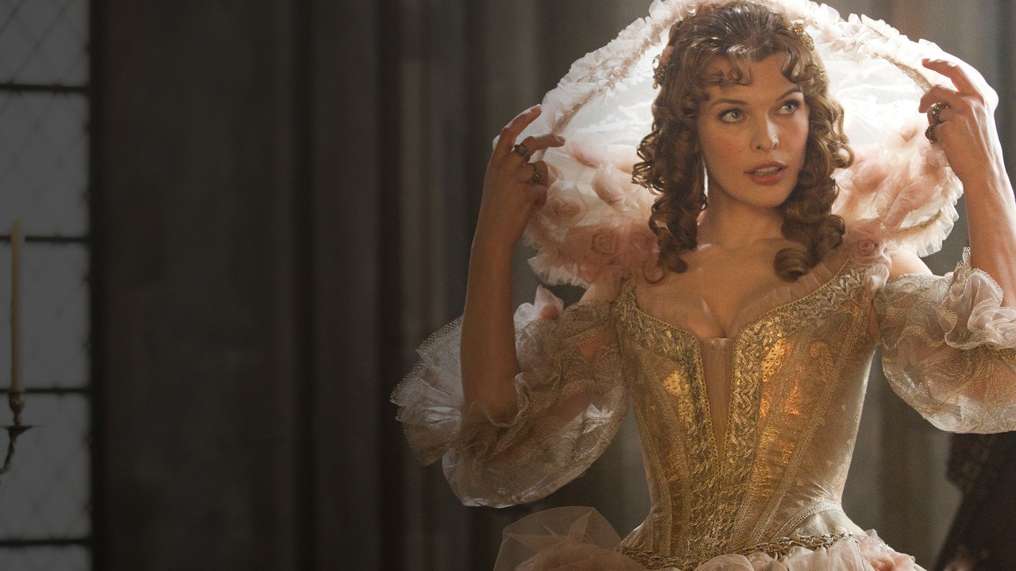 Milla Jovovich wearing a fancy dress in The Three Musketeers