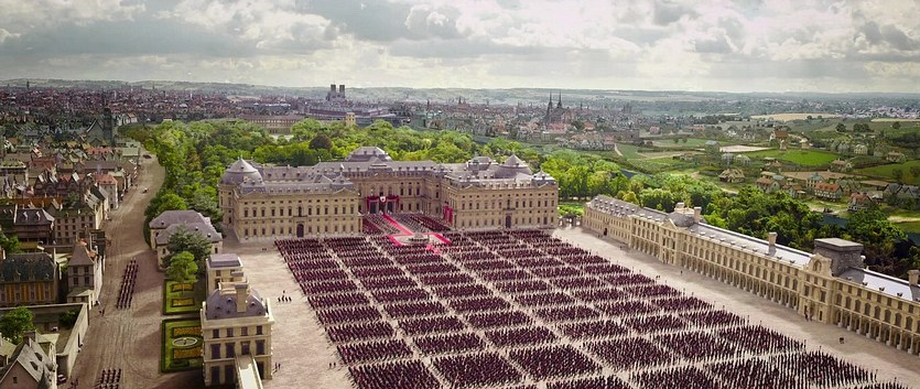 A massive crowd outside a government building in The Three Musketeers