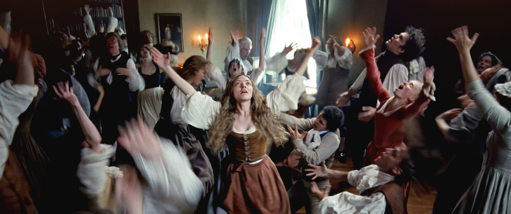 In The Testament of Ann Lee, Ann Lee (Amanda Seyfried) and the Shakers be shaking