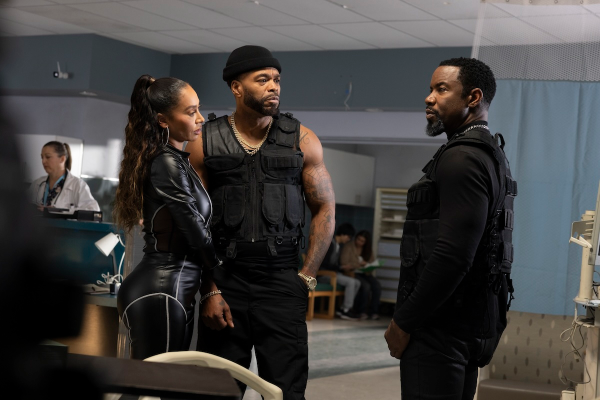 Michael Jai White, Method Man, and La La Anthony in a hospital waiting room in Trouble Man