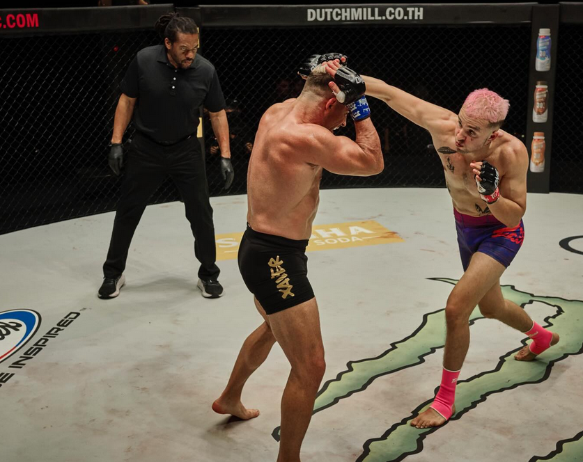 Mojean Aria and Bren Foster fight in the Octagon as Herb Dean watches in Beast