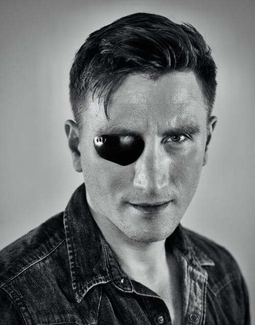 A headshot of Jason Trost