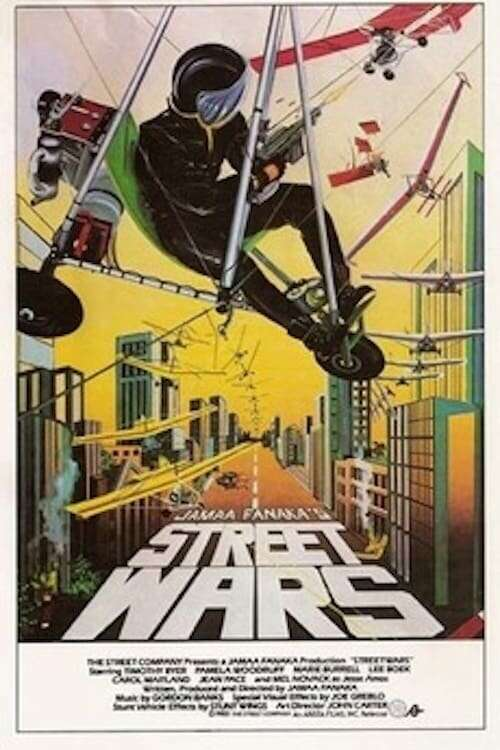 Poster for Street Wars, with a man from a gun from a light aircraft/glider situation at a bunch of other planes in the middle of a city setting