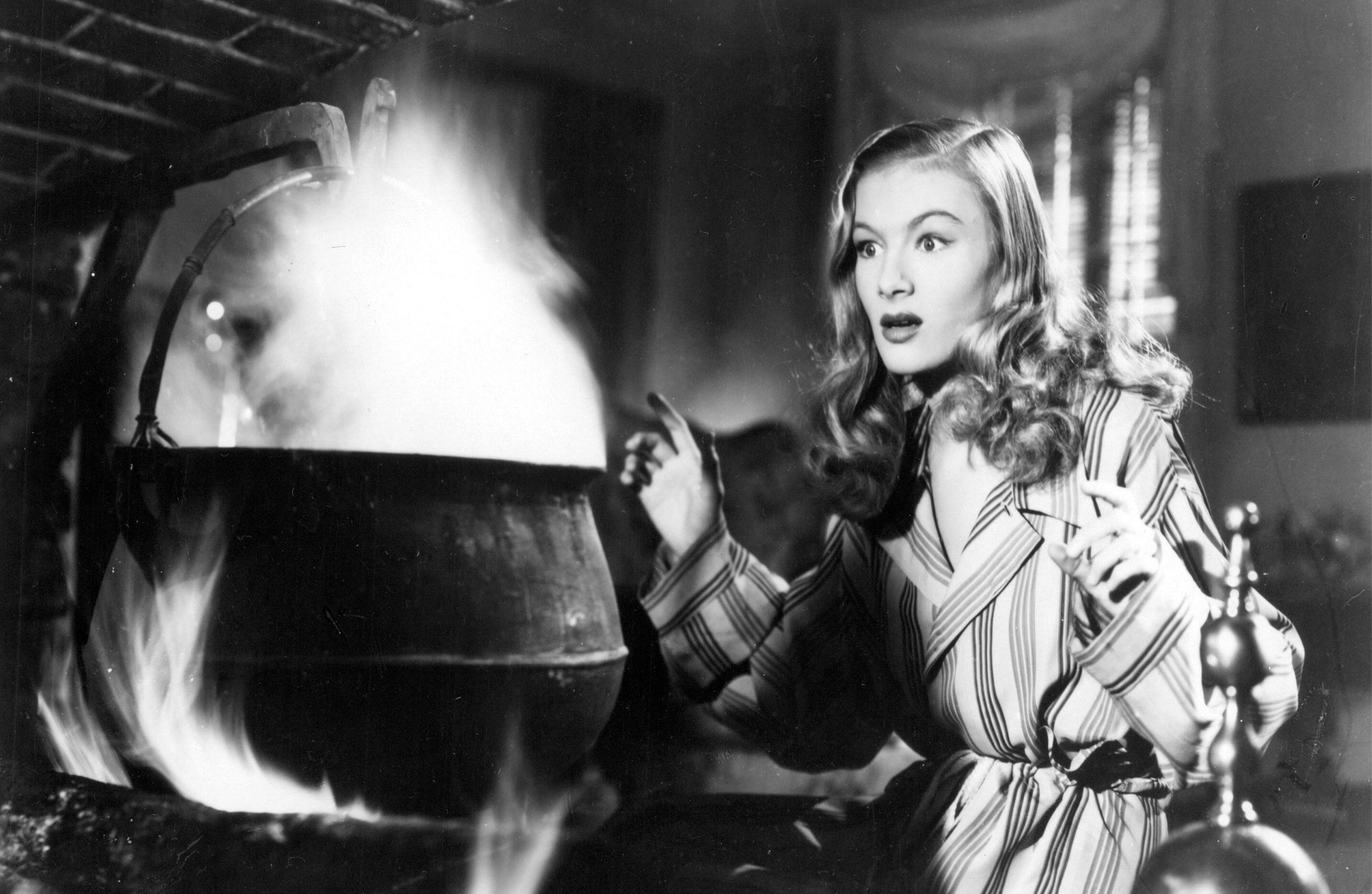 Veronica Lake next to a boiling cauldron in I Married a Witch
