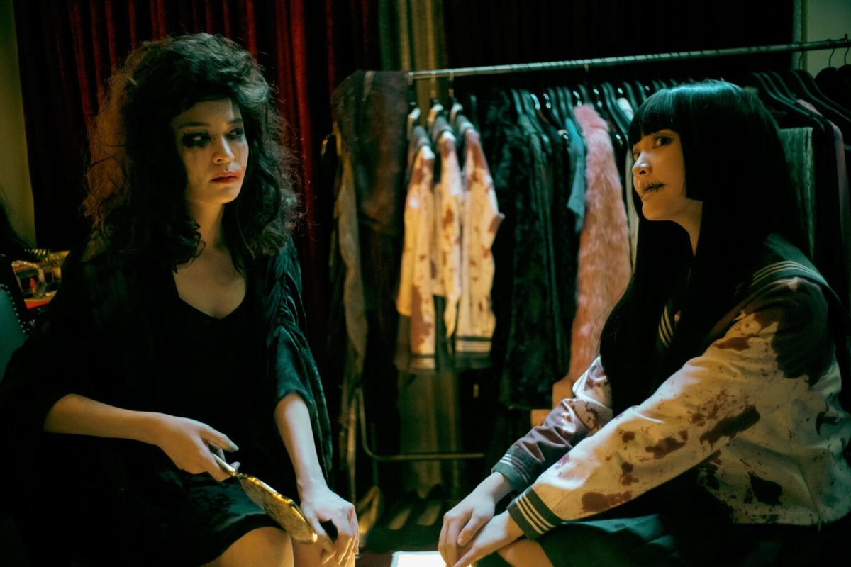 Sandrine Pinna and Gingle Wang in full ghost get-up in Dead Talents Society