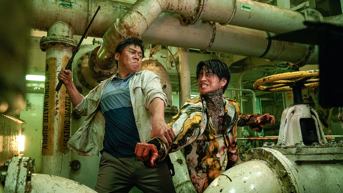 An officer with a baton fights a tatted-up convict in the lower decks of a ship in Project Wolf Hunting