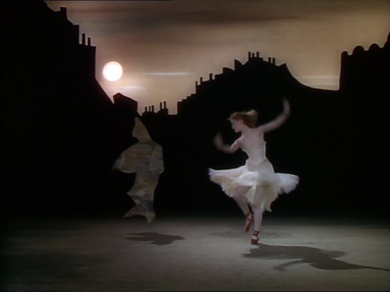 Moira Shearer dances with a shimmering figure in The Red Shoes