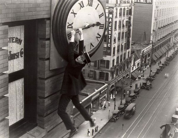 Harold Lloyd hanging from a clock in Safety Last!