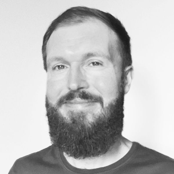 Black & white head shot of Matthew Reynolds