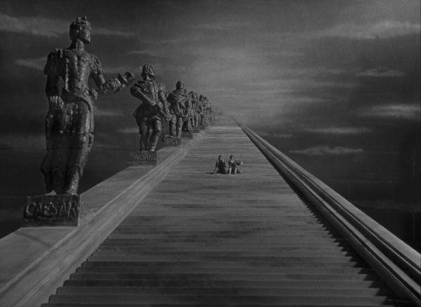 The long staircase to heaven in A Matter of Life and Death, with two figures sitting way up