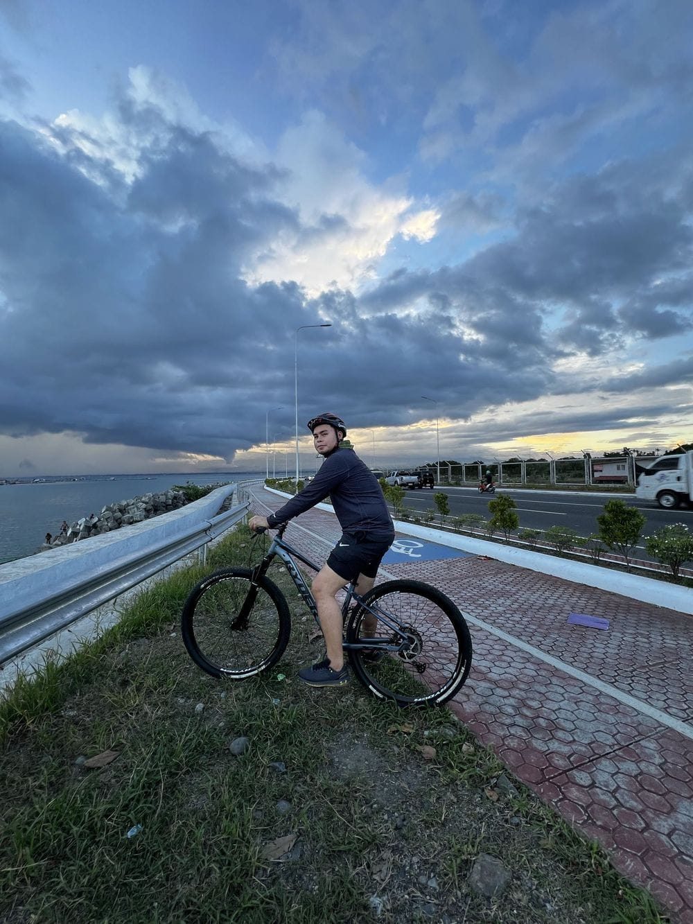 John Talaguit on a sunset bike ride along the coast