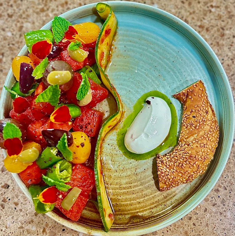 Tomato and watermelon dish with simit.