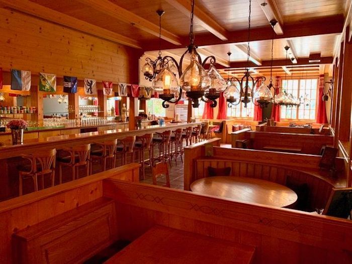 cozy interior of Matterhorn is full of booths and knotty pine