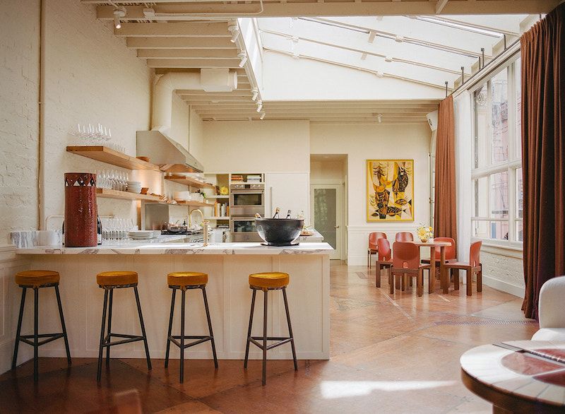 The exquisitely chic Officina space with a bar and natural light