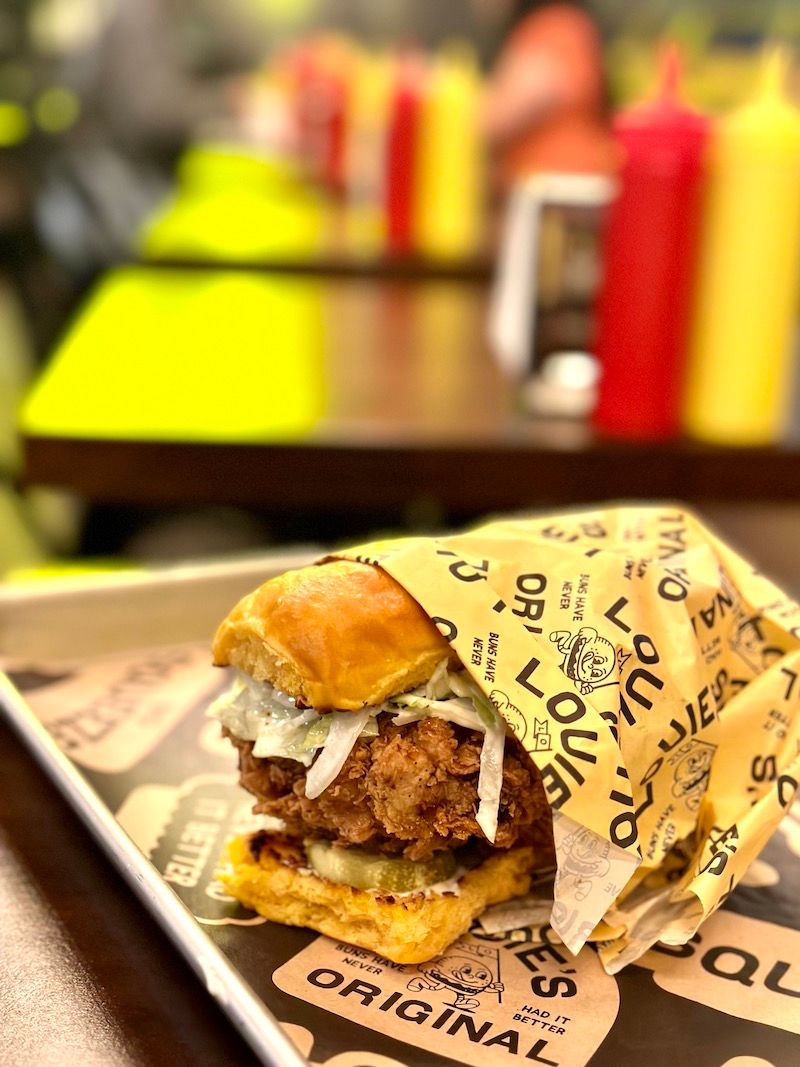 fried chicken sandwich on a sweet potato bun