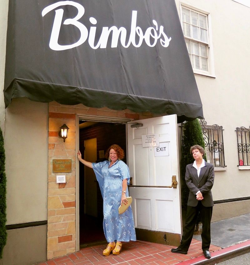 marcia gagliardi outside a side entrance of bimbo's with security
